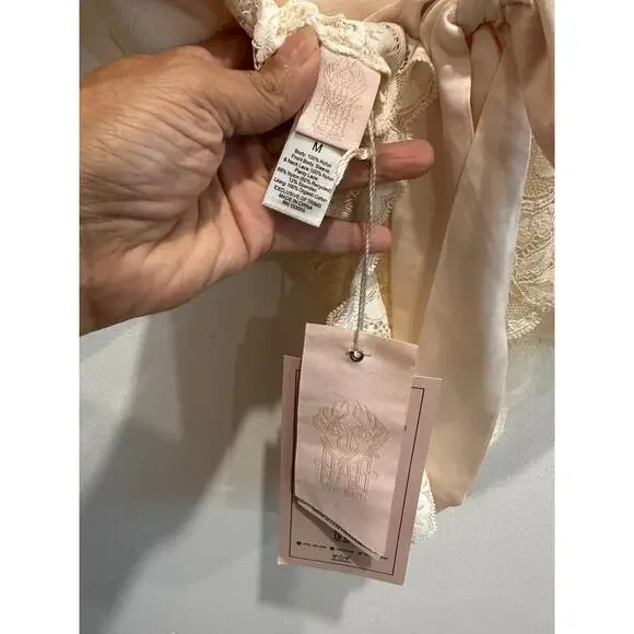 We Are HAH Take HAH Bow Reversible Bodysuit Creme Shear Lace Plunge NWT size M - Picture 11 of 15